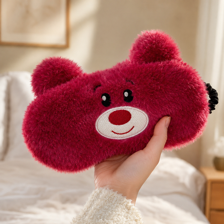 Cute animal sleep eye mask in soft plush - shown with sleepwear
