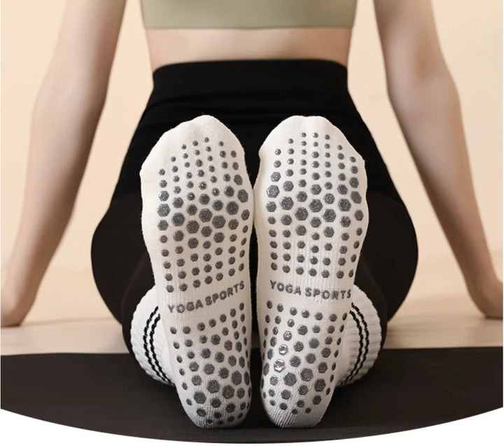 Mid calf cotton grip socks shown on foot