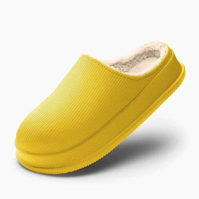 Slip on mule slippers shown as a pair