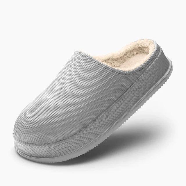 Cushioned molded sole on a womens house slipper