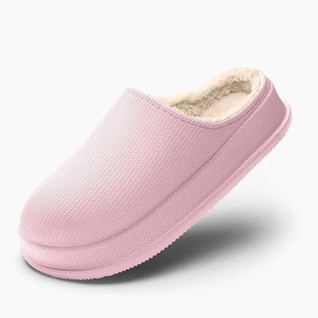 Soft lined closed toe slipper shown from the side